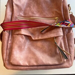 Elegant mauve Backpack with Colorful Strap